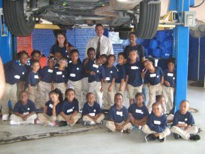 Kindergarteners visit Mike Anderson Chevrolet, to learn how a car operates